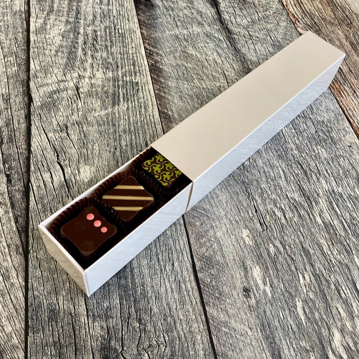 Boîte de 12 chocolats fins